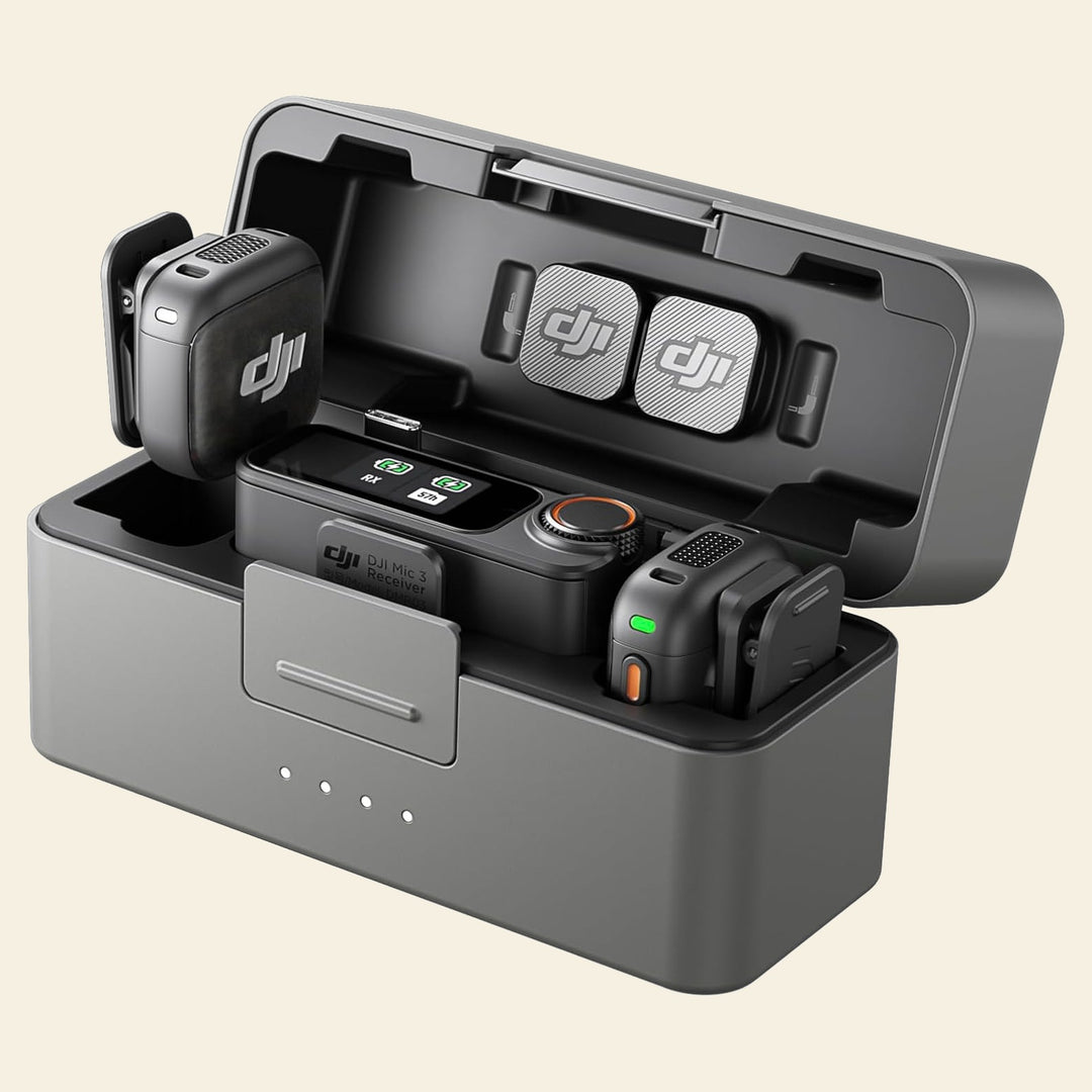 DJI Mic 3 wireless microphone system with two transmitters, receiver, and charging case used for filming boating adventures | Drops in the Ocean